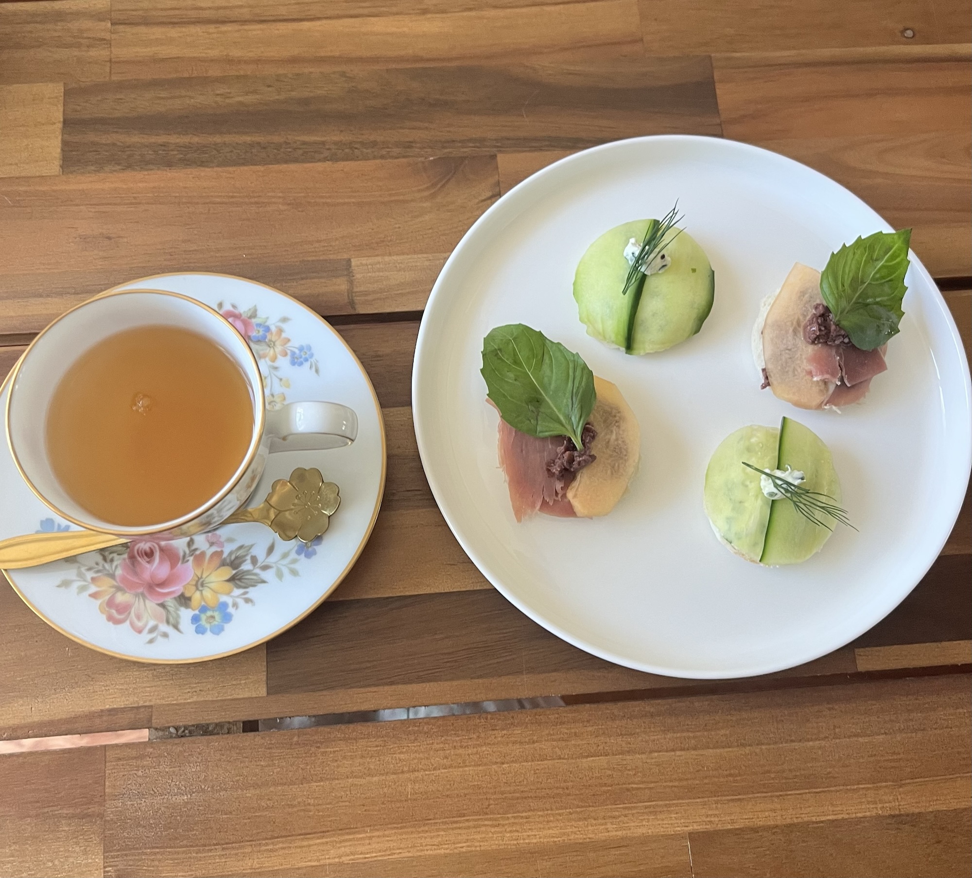 A tea of tea with Afternoon Tea Cucumber and Prosciutto Melon Sandwiches